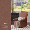 A recliner chair in a living room setting with a window view of a garden. Anteprima dell’immagine prodotto