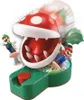 A Super Mario Piranha Plant Escape! toy with Mario and Luigi figures. Produktbild-Vorschau