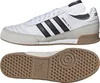 A pair of Adidas Mundial Goal Hallenschuhe Herren shoes are shown from the side and from the sole. Produktbild-Vorschau