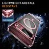 A pink phone case with a magnetic ring is shown at an angle against a dark, rocky background. Text overlays highlight features. Náhled obrázku produktu