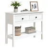 A white console table with two drawers and a bottom shelf, decorated with a plant, books, and a framed picture. Produktbild-Vorschau