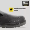 Close-up of a black safety shoe with water droplets on it, indicating water resistance. Marketing text and a logo are present. Náhľad obrázku produktu