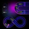 RC drift cars on illuminated tracks, one in a figure-eight and another in a U-turn. Produktbild-Vorschau