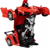 A red toy robot that can transform into a car, shown in its robot form. Produktbild-Vorschau