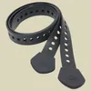 A black binding strap kit is coiled and laid out against a light gray background. Produktbild-Vorschau