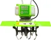 A close-up, front-facing view of a green and white gasoline-powered tiller. Voir les images du produit