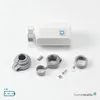 A white smart home radiator thermostat and its accessories are laid out on a white background. Produktbild-Vorschau