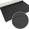 A roll of black faux leather fabric is shown, with a close-up inset of the textured surface. Podgląd zdjęcia produktu