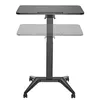 A black mobile laptop desk with pneumatic height adjustment and wheels, shown on a white background. Náhled obrázku produktu