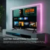 A modern living room with a large TV displaying a streaming service interface, surrounded by ambient pink lighting. Produktbild-Vorschau