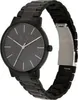 A black Armani Exchange watch with a gray dial and silver hands, shown on a white background. Anteprima dell’immagine prodotto