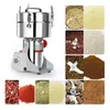A collage of a grain grinder and various ground ingredients. Produktbild-Vorschau