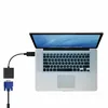 A laptop connected to a VGA adapter and cable on a white background. Produktbild-Vorschau
