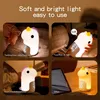 A collage of four images showing a unicorn-shaped night light in different settings and uses. Produktbild-Vorschau