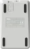 The underside of a white 8BitDo Retro Mechanical Keyboard, showing the product label and rubber feet. Produktbild-Vorschau
