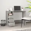 A desk with drawers and a laptop on it, placed in a room. Anteprima dell’immagine prodotto
