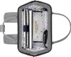 Top-down view of an open backpack with various items inside. Produktbild-Vorschau