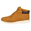 A side view of a tan Timberland chukka boot with a white sole. Produktbild-Vorschau