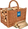 A woven basket filled with firewood, with some firewood pieces in front of the basket. Náhľad obrázku produktu
