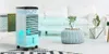 A portable air cooler is shown in a modern living room setting. Produktbild-Vorschau