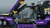 Close-up view of the interior and side of a purple and black LEGO Technic extreme off-road vehicle. Produktbild-Vorschau
