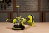 A cordless angle grinder is placed on a wooden surface in a workshop setting. Produktbild-Vorschau