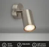 A silver wall light fixture is mounted on a gray wall. Produktbild-Vorschau