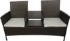 A brown rattan sofa with white cushions and a central table, isolated on a white background. Anteprima dell’immagine prodotto