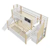 A white and natural wood bunk bed with a slide and stairs, shown from a high angle against a white background. Náhled obrázku produktu