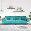 A turquoise sofa with cushions is shown in a well-lit room with shelves on the wall. Produktbild-Vorschau