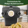 A close-up of a black Philips pasta maker with fresh pasta in the foreground. Podgląd zdjęcia produktu