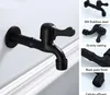 A black faucet mounted on a white wall, with close-up shots of its features on the right side. Produktbild-Vorschau