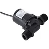 A black DC 12V solar water circulation pump with threaded connectors is shown against a white background. Voir les images du produit