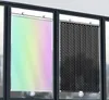 Zwei ausziehbare Fensterschutzblenden, eine mit Regenbogenverlauf und dezentem Muster, die andere schwarz mit weißen Punkten Náhľad obrázku produktu