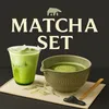 A matcha set with a drink and a bowl of matcha. Produktbild-Vorschau