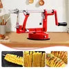A red spiralizer tool is shown on a countertop, with three smaller images below showing spiralized potatoes. Produktbild-Vorschau