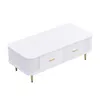 A white coffee table with two drawers and gold legs and handles, shown from a slightly elevated angle on a white background. Produktbild-Vorschau