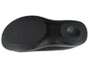 The underside of a black shoe. Produktbild-Vorschau
