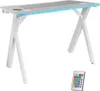 A white gaming desk with blue LED lighting and a remote control. Produktbild-Vorschau