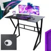 A gaming computer desk setup with a monitor, keyboard, mouse, and controllers, along with close-up details of the desk. Náhled obrázku produktu