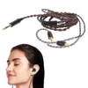 A woman wearing an earbud, with a headphone cable shown above her. Produktbild-Vorschau