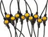 A string of outdoor lights with yellow bulbs and black cords against a white background. Produktbild-Vorschau