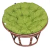 A round papasan chair cushion with a green tufted fabric cover is shown from a top-down perspective against a white background. Produktbild-Vorschau