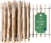 A close-up view of a wooden fence roll with a product tag attached. Náhled obrázku produktu