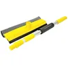 A yellow and black window squeegee with an extendable silver and yellow handle is shown against a white background. Podgląd zdjęcia produktu