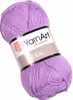 A ball of lilac yarn with a label. Produktbild-Vorschau