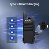 A walkie-talkie is shown connected to a charger, with icons indicating various charging methods. Náhľad obrázku produktu