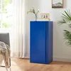 A blue metal cabinet with a sliding door is shown in a room with a chair and curtains. Voir les images du produit