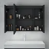 A dark gray bathroom cabinet with its doors open, displaying various toiletries and containers on its shelves, mounted above a white sink. Produktbild-Vorschau