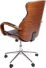 A rear view of a modern office chair with a wooden shell and black leather seat. Podgląd zdjęcia produktu